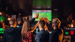 Friends Watching the game on the TV