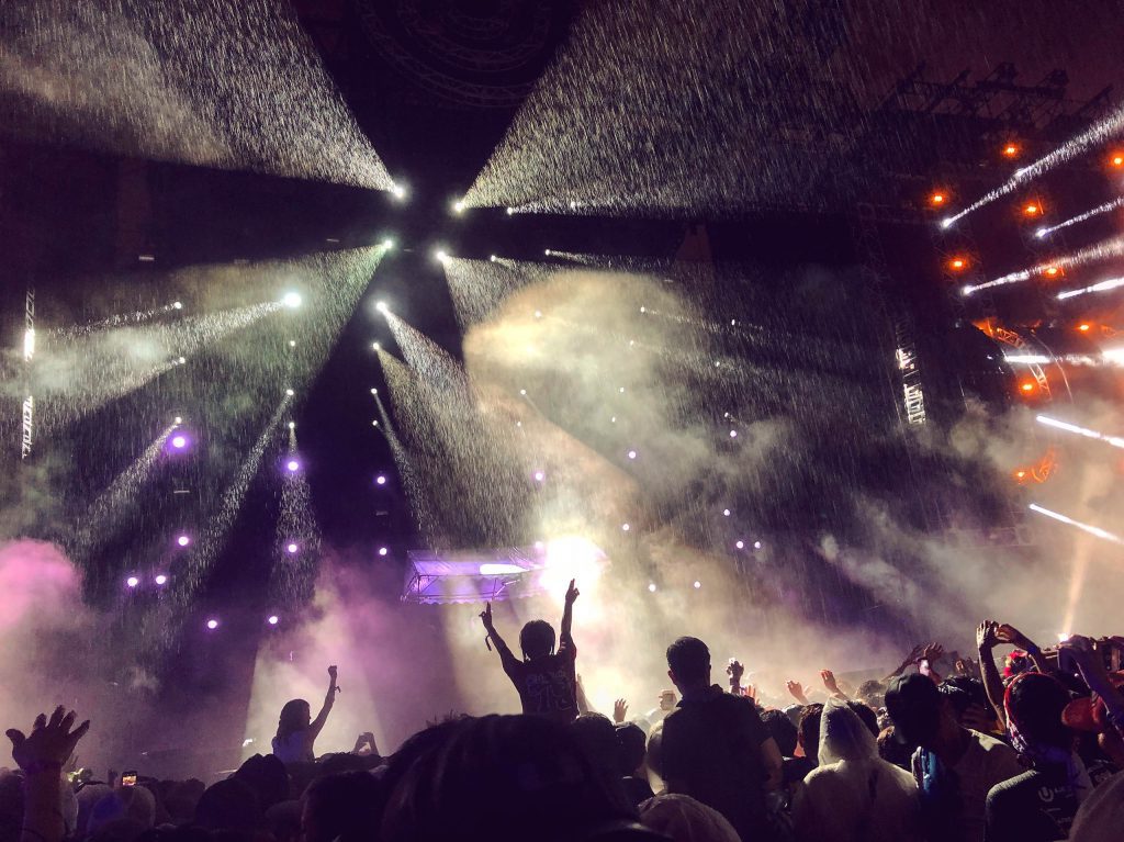 People at a concert in the rain