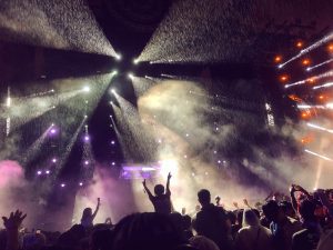 People at a concert in the rain
