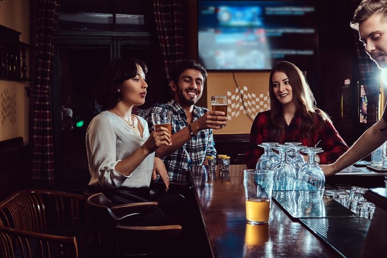 people happy at a bar