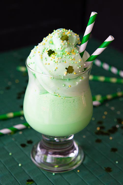 Green drink with whipped cream for St Patricks Day