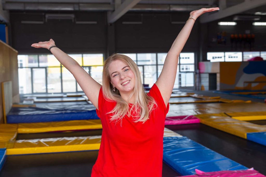 Woman in front of trampoline park