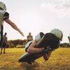 Football players practicing outside