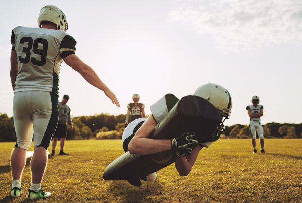 Football players practicing outside