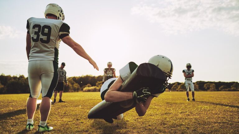 Football players practicing outside