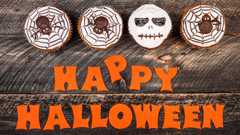 Halloween Image with cakes and the words Happy Halloween