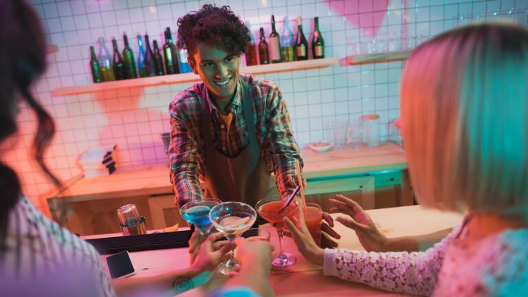 Bartender serving drinks in a pink Valentines day theme