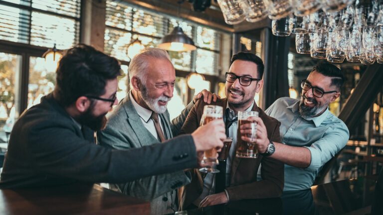 Dads toasting at the bar