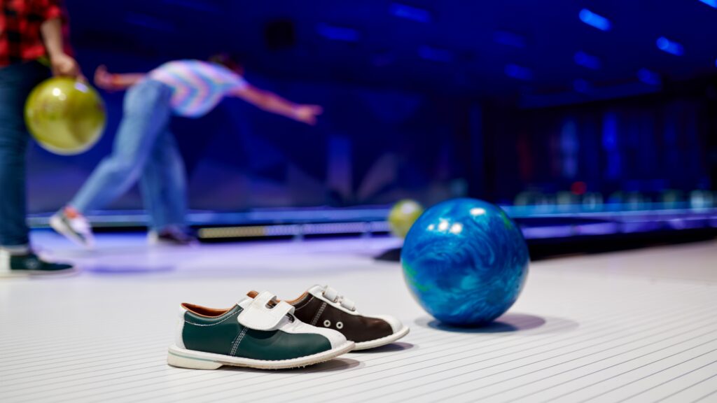 Bowling Shoes and Ball on lane