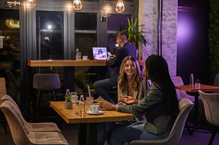 Woman at a computer in a restaurant