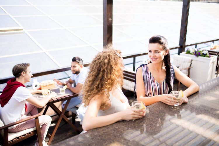 Girls having patio drinks