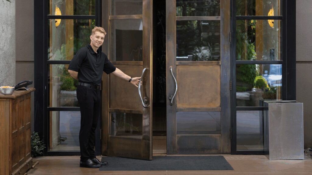 Man Opening a restaurant door