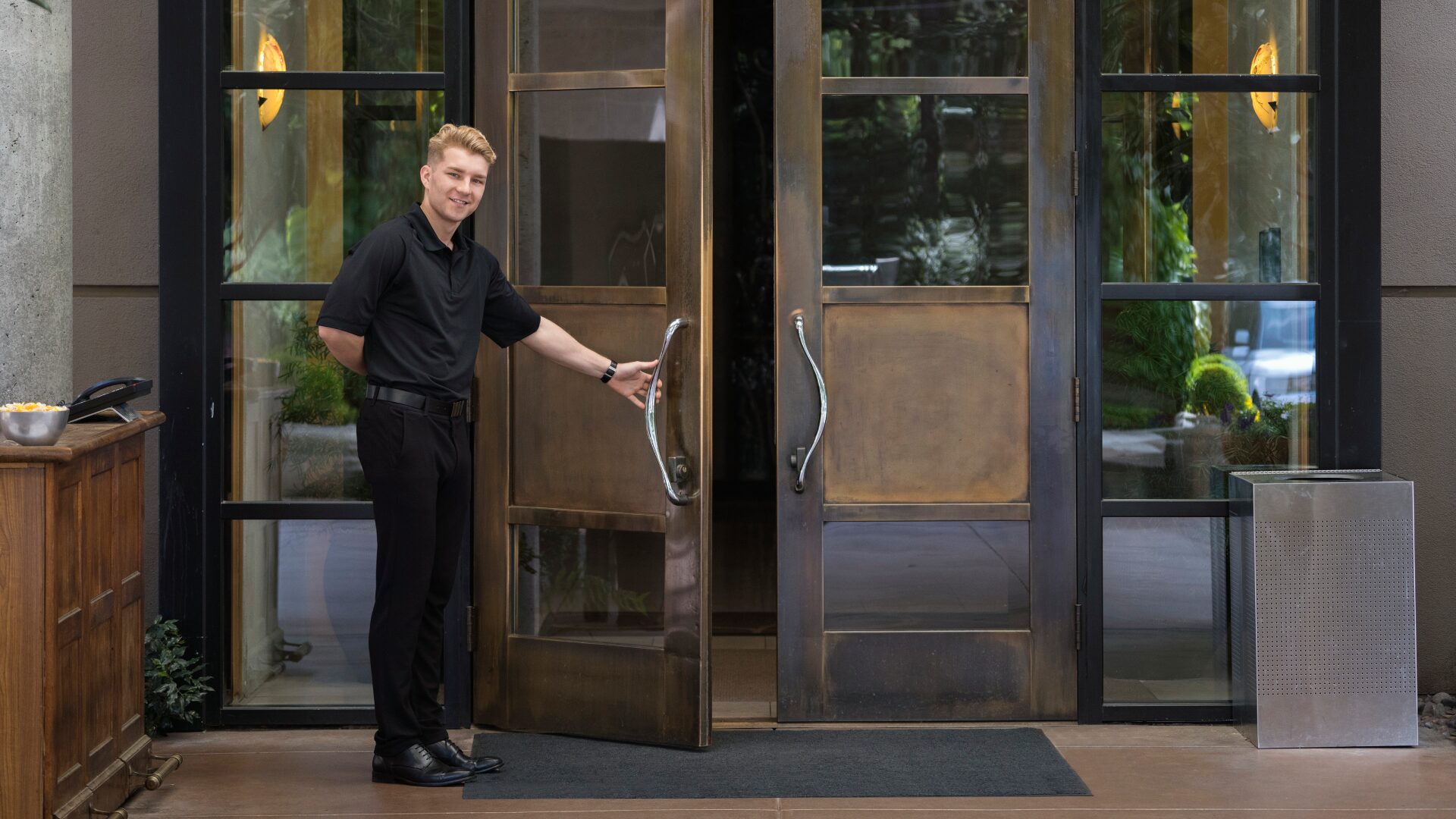 Man Opening a restaurant door