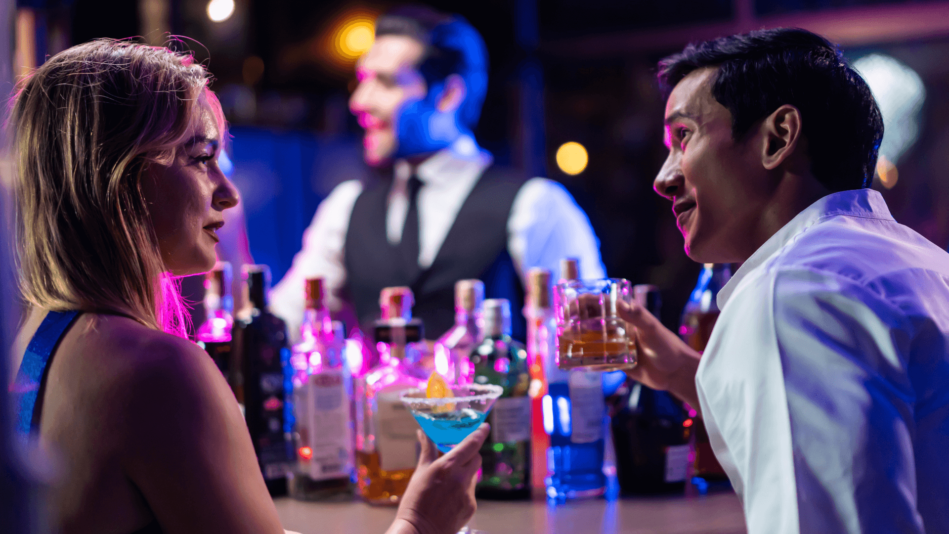 Bar Atmosphere Atmosphere in a bar, man and woman having drinks