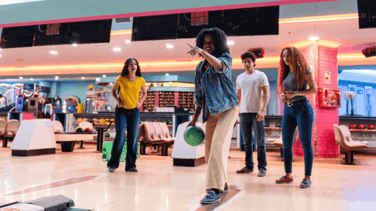 Friends bowling together