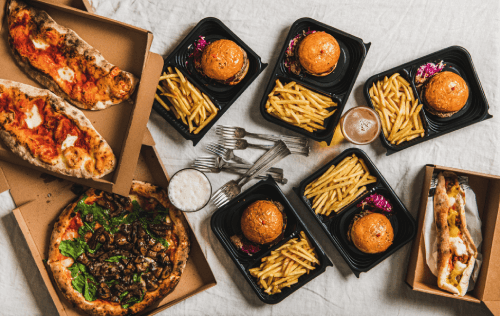 Take out food containers with Burgers and Pizza
