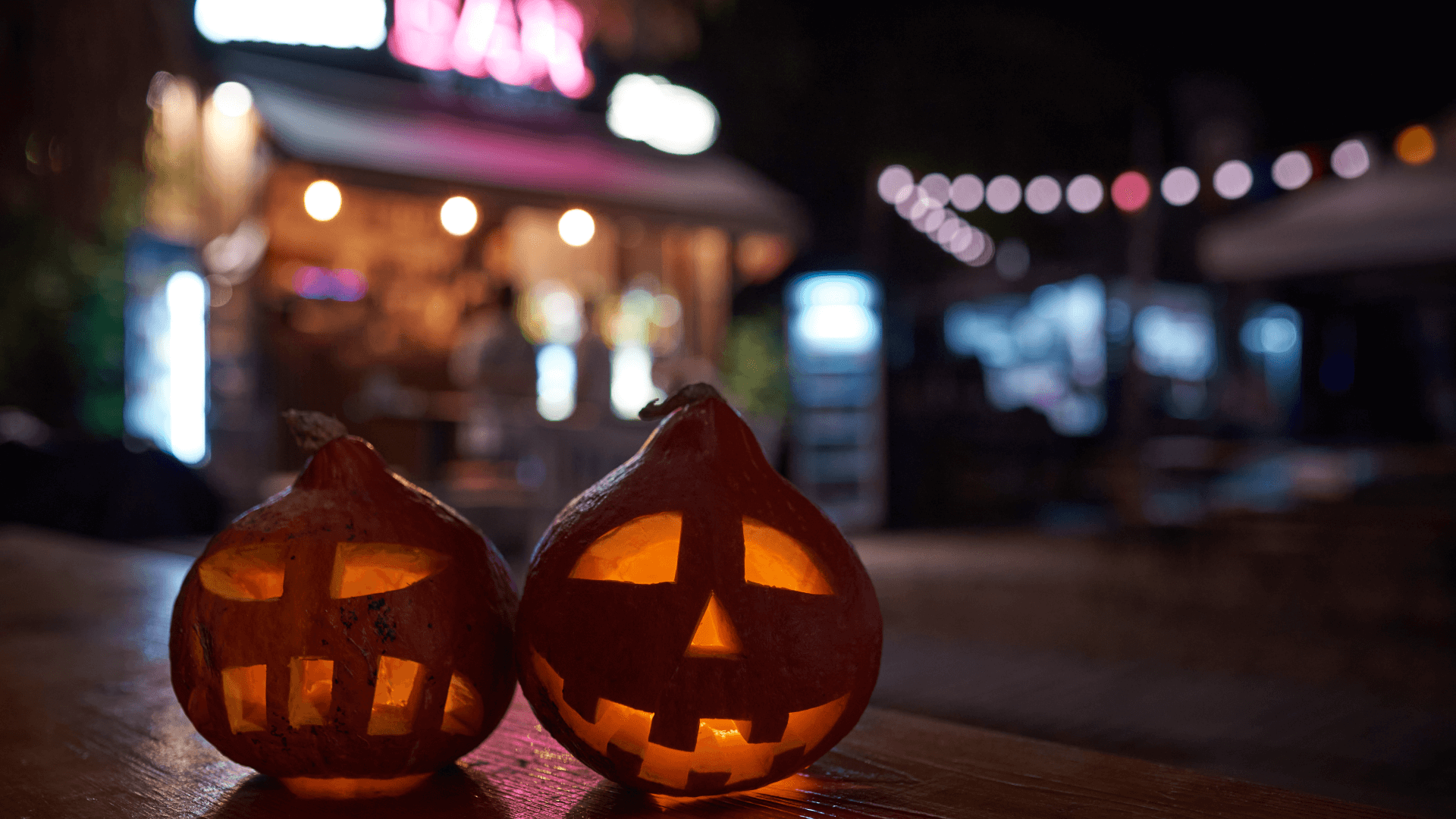 Pumpkins in front of a bar