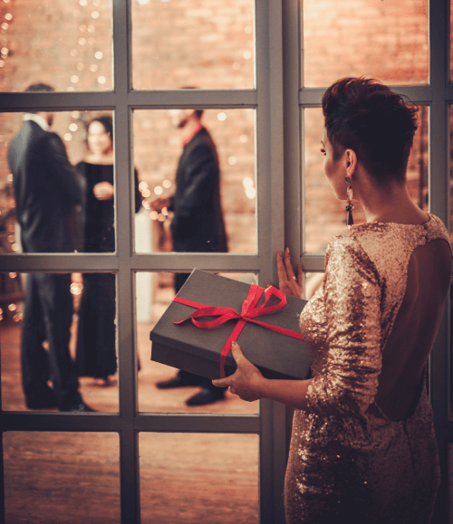 A woman holding a gift