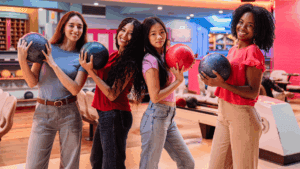 Girls at a bowling alley