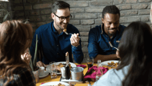 people eating dinner at a restaurant