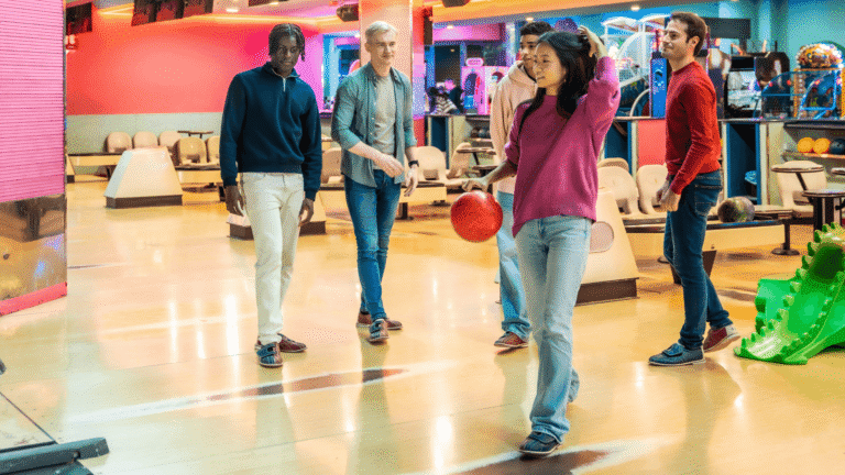 Friends on a bowling lane